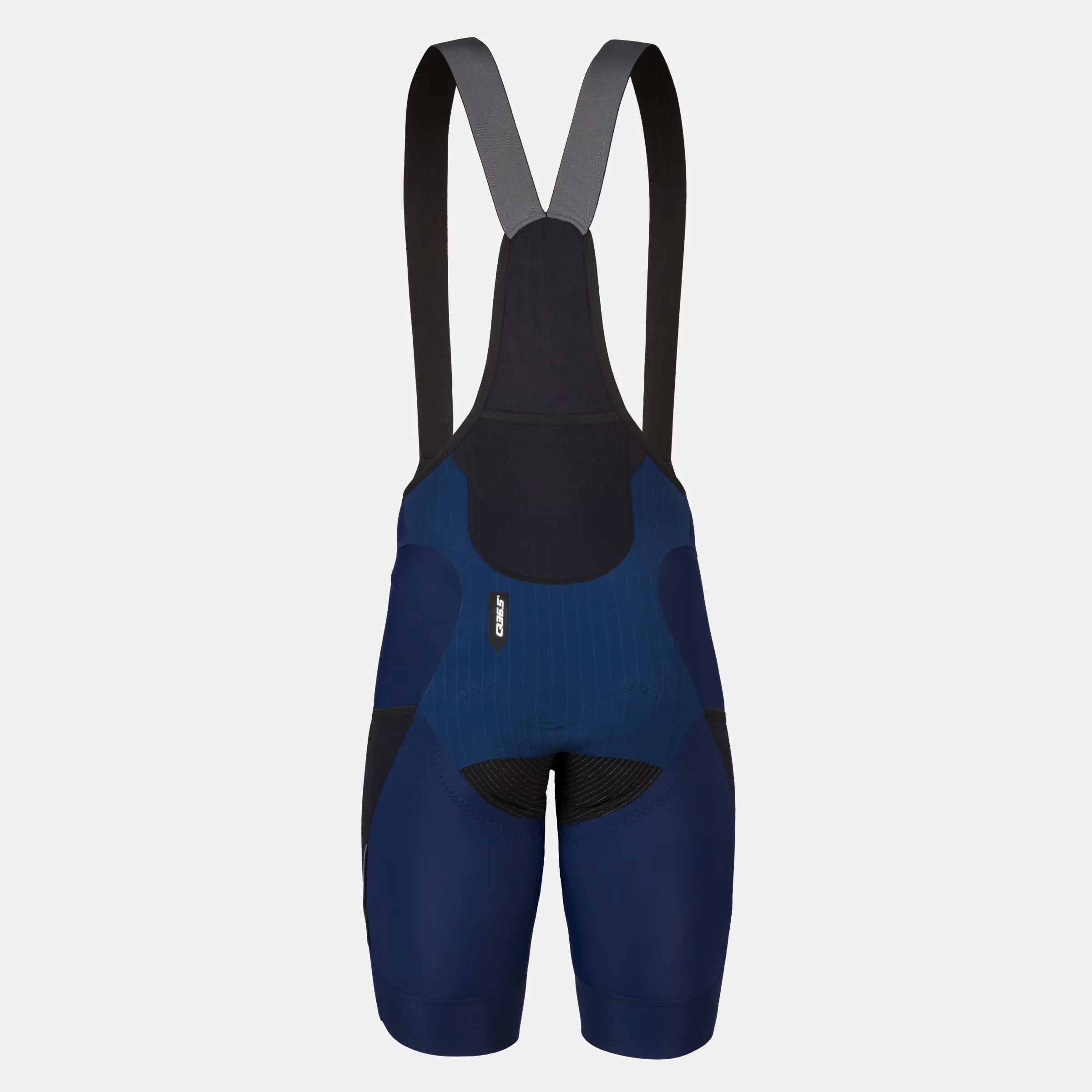 Back view of Q36.5 Adventure Cargo Bib Shorts - Men's - Navy Blue featuring breathable mesh upper and ergonomic fit