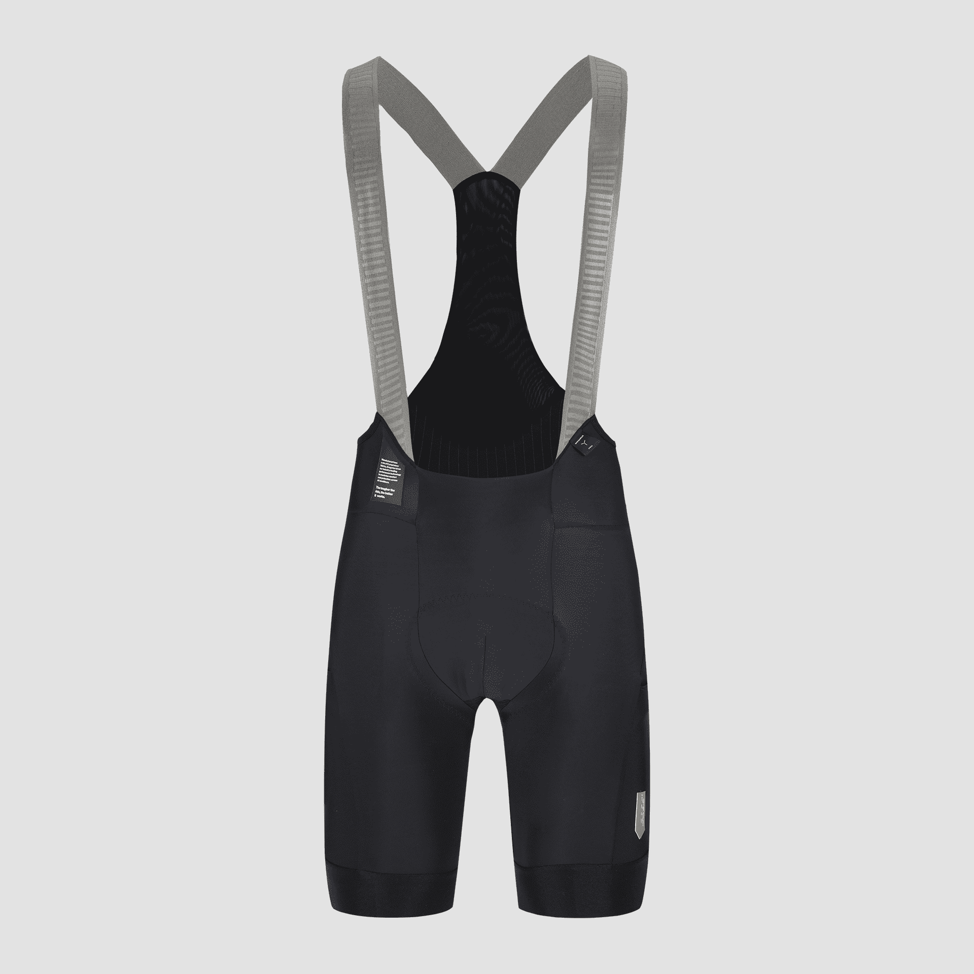 Q36.5 Adventure Cargo Bib Shorts - Men's - Black showing back mesh straps and ergonomic padded cycling fit