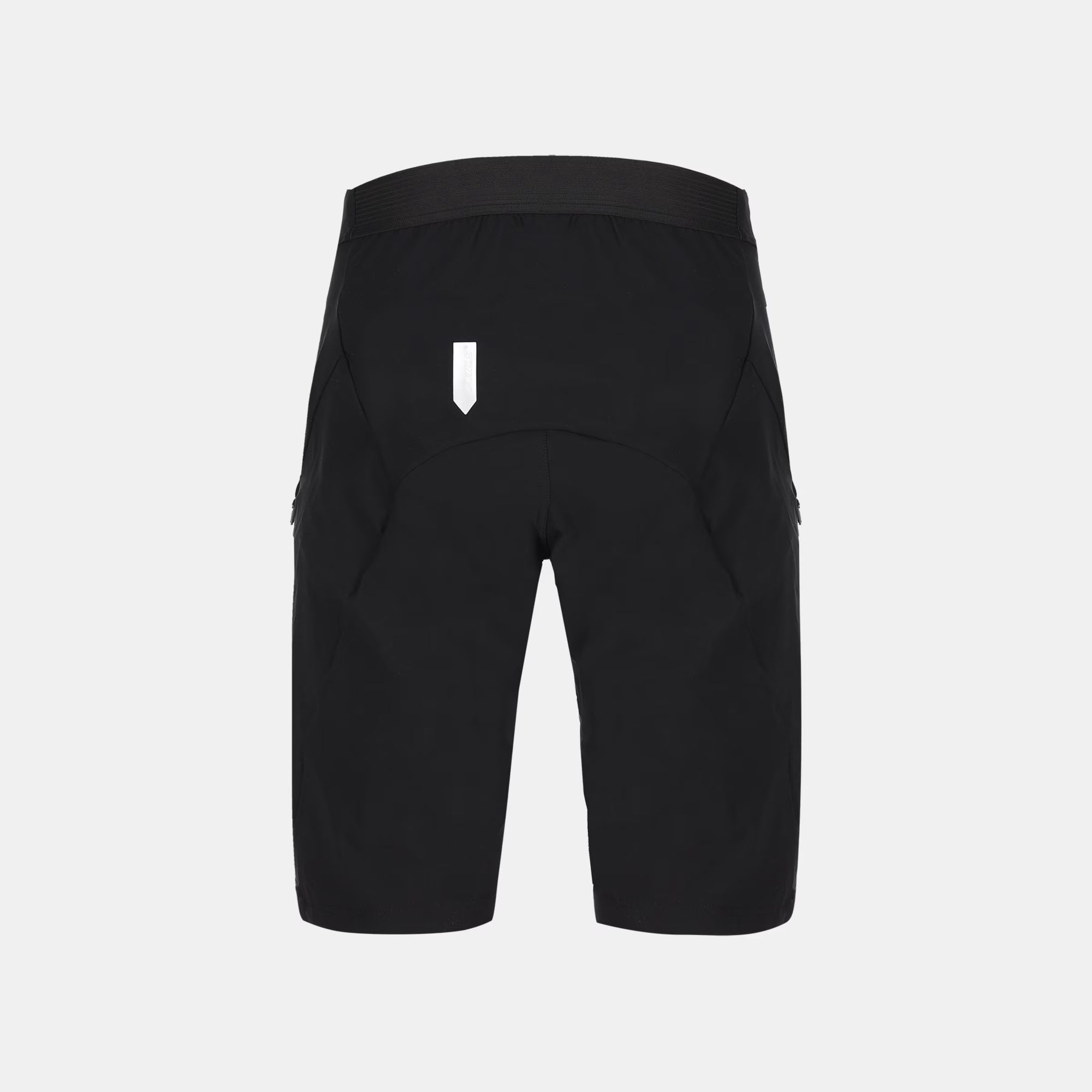 Back view of Q36.5 Adventure Baggy Shorts - Men's - Black showing sleek design and reflective detail at waistband