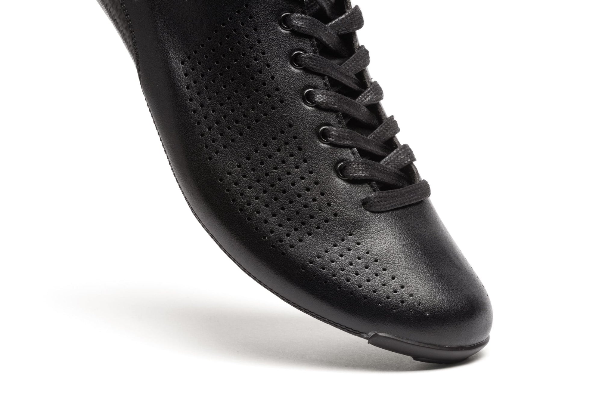 Close-up of Nimbl AIR climbing shoe in black showing perforated breathable upper and sleek lace-up design