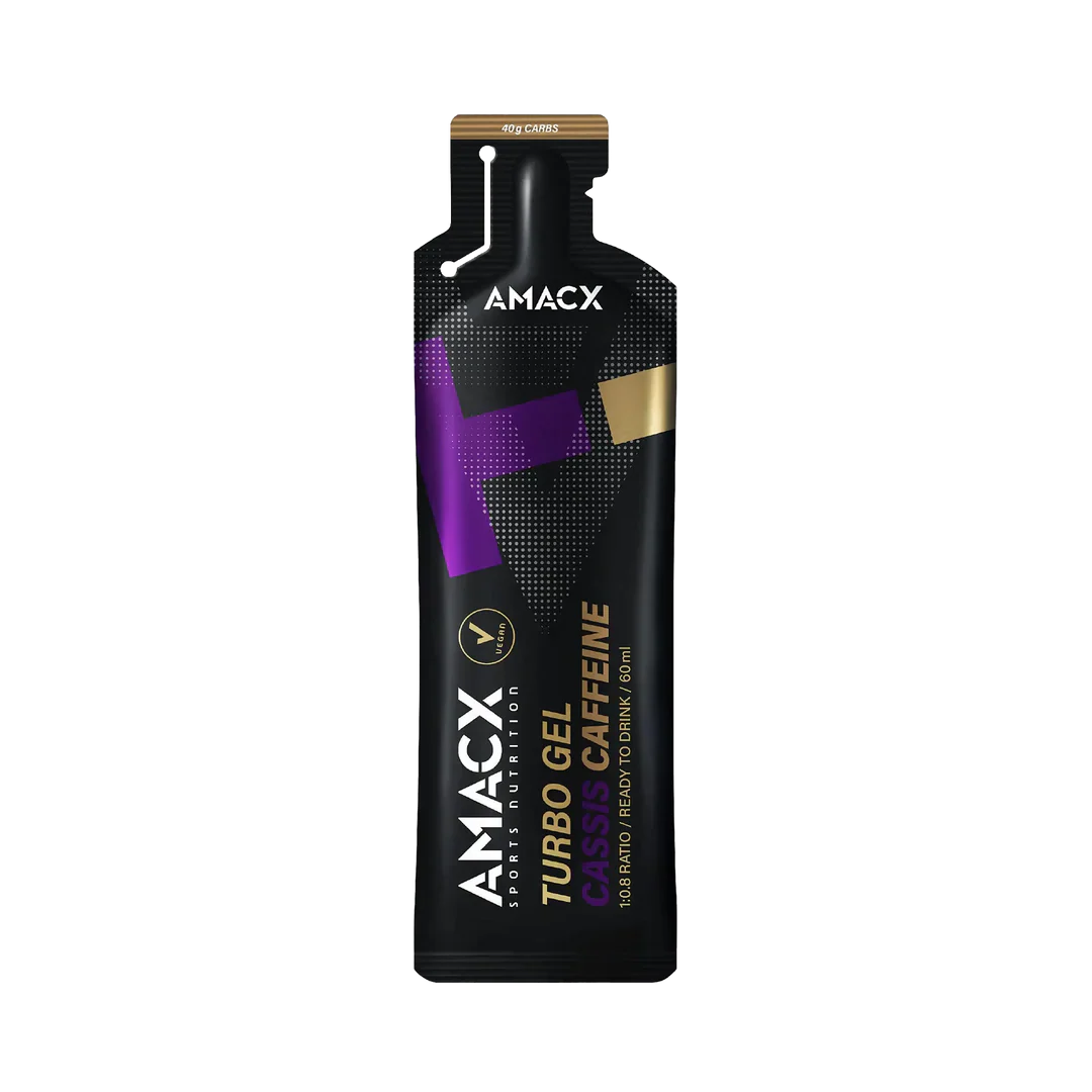 Black and purple energy gel pouch with gold accents labeled Amacx Turbo Gel Cassis Caffeine.