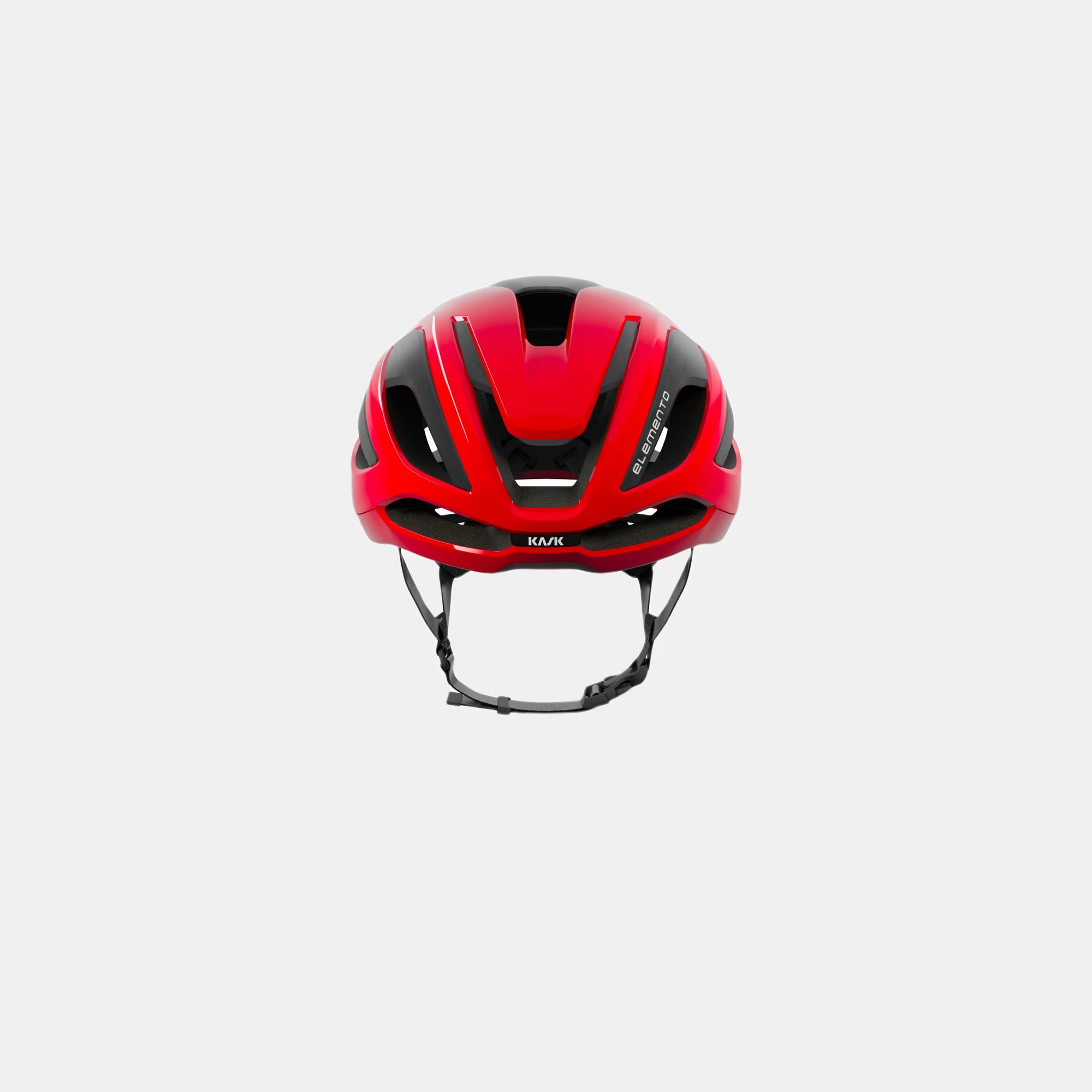 Kask Elemento Helmet - Red front view showing aerodynamic vents and adjustable chin strap for secure fit