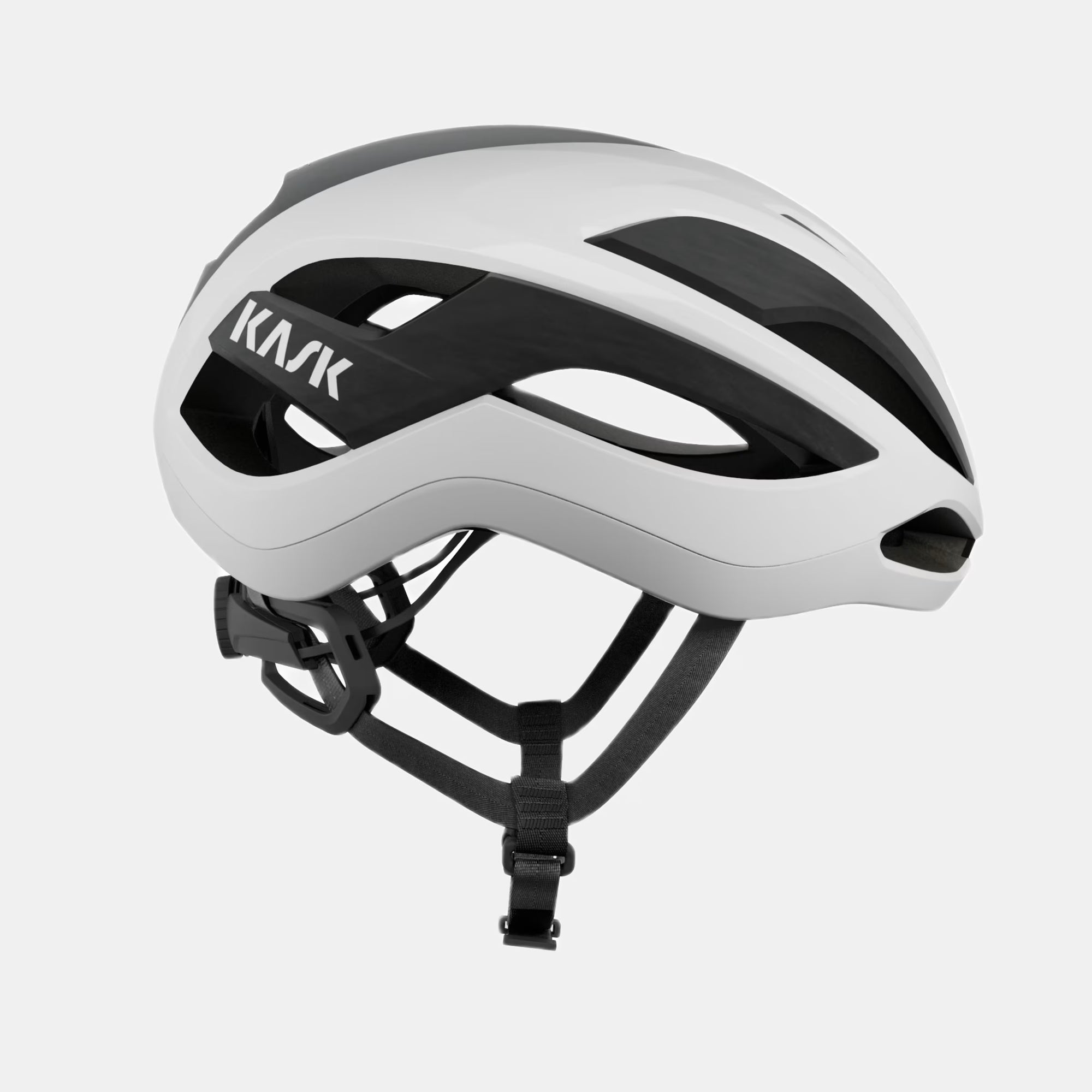 Kask Elemento Helmet - White side view showing aero design, ventilation channels, and adjustable straps for cycling safety and comfort