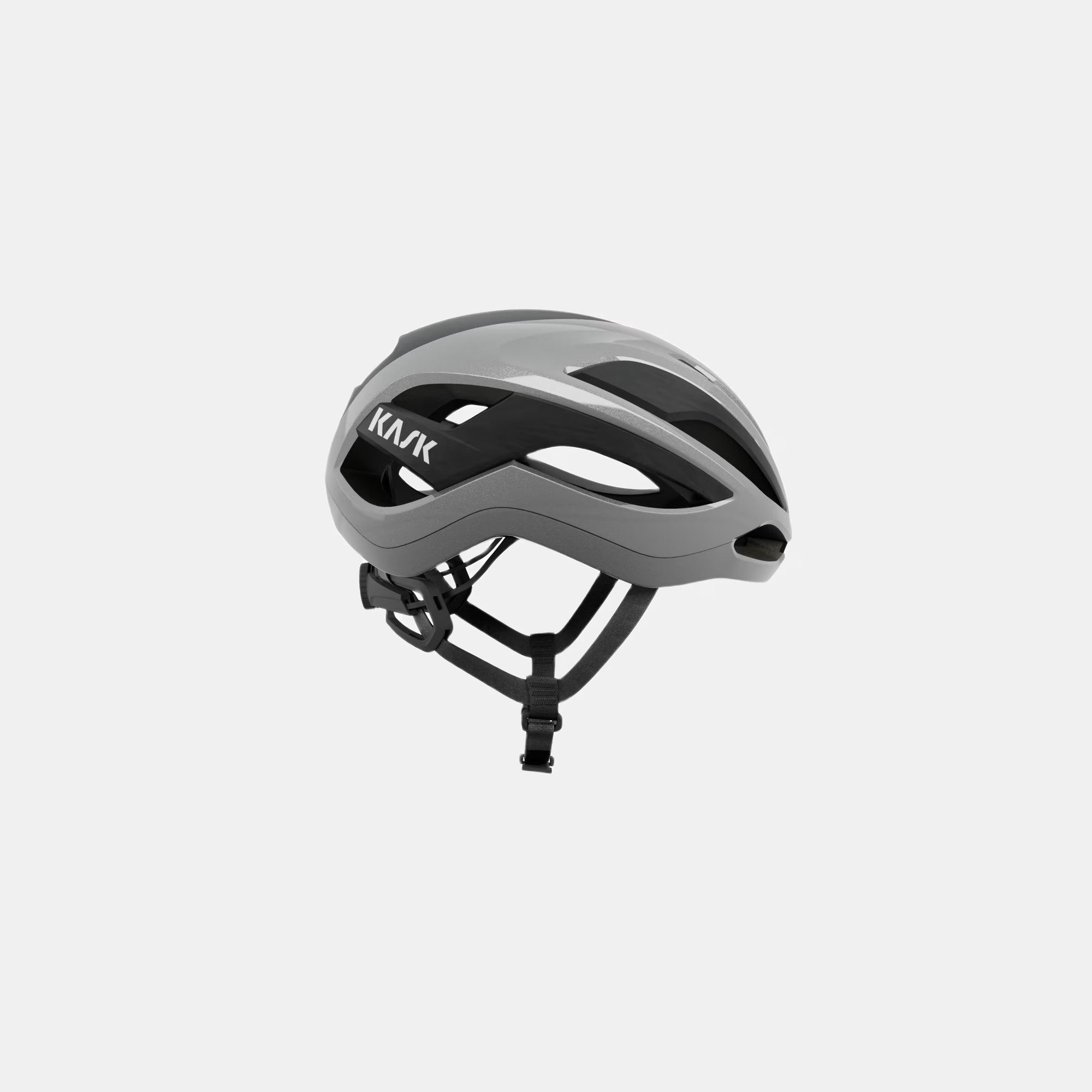 Kask Elemento Helmet - Silver side view showing aerodynamic design and adjustable straps for cycling safety and comfort