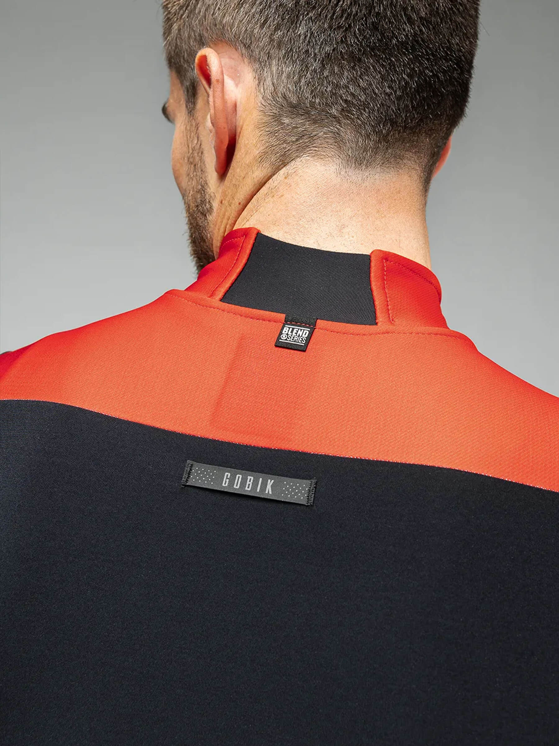 Back view of man wearing GOBIK Mist Blend 2.0 Jacket - Men's showing collar and fabric texture details