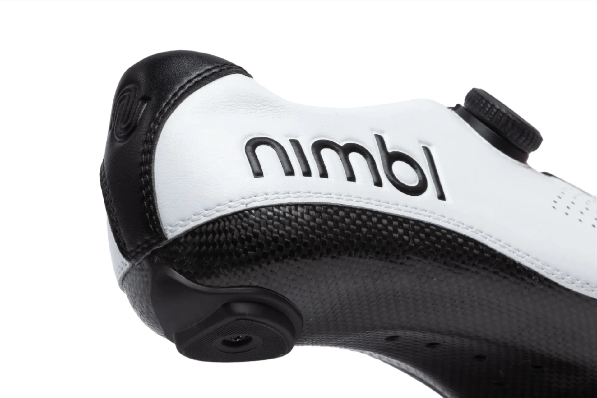 Close-up of white and black Nimbl FEAT cycling shoe showing side logo and adjustable dial closure system