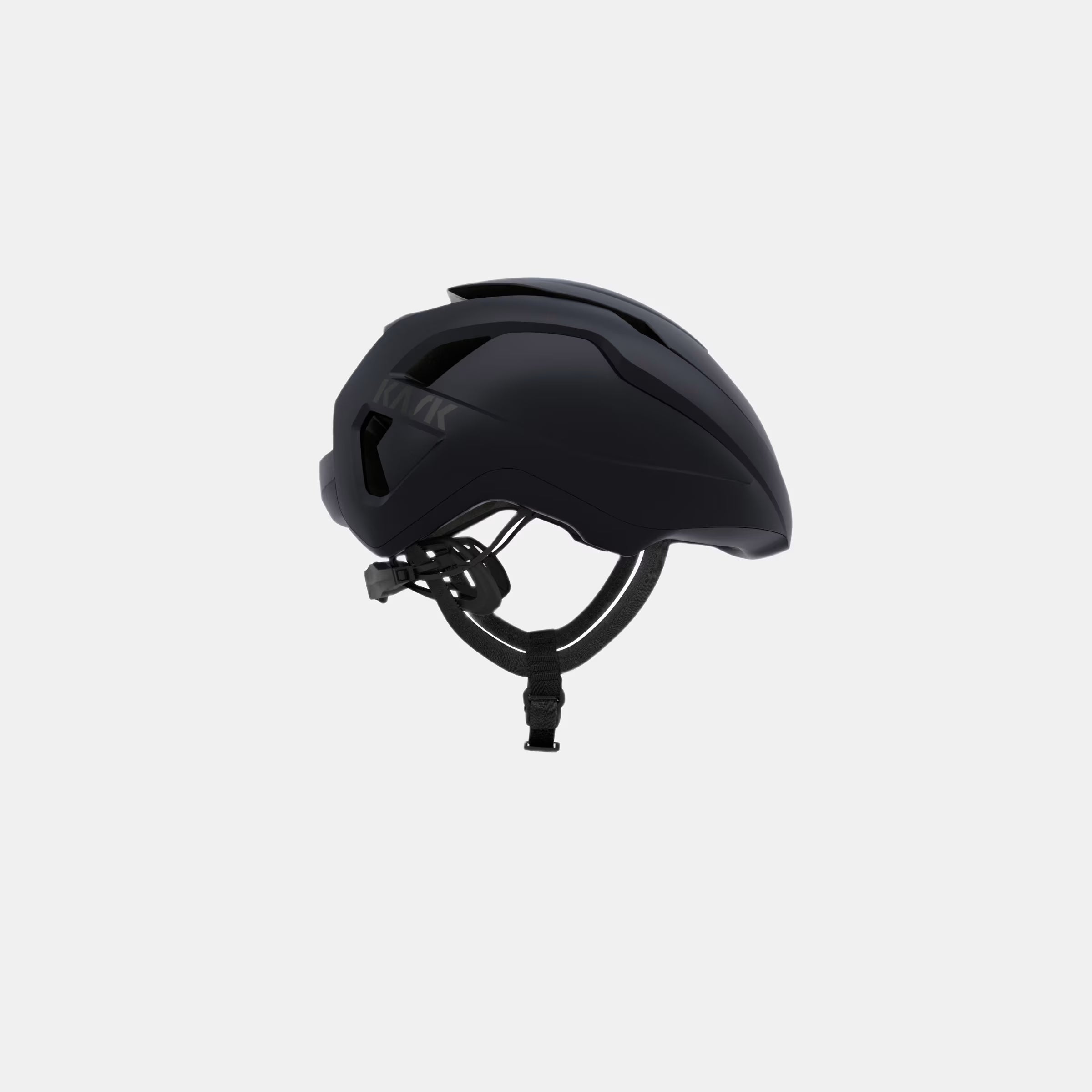 Kask Wasabi Helmet - Black Matt side view showing sleek design and adjustable ventilation for all-season cycling comfort