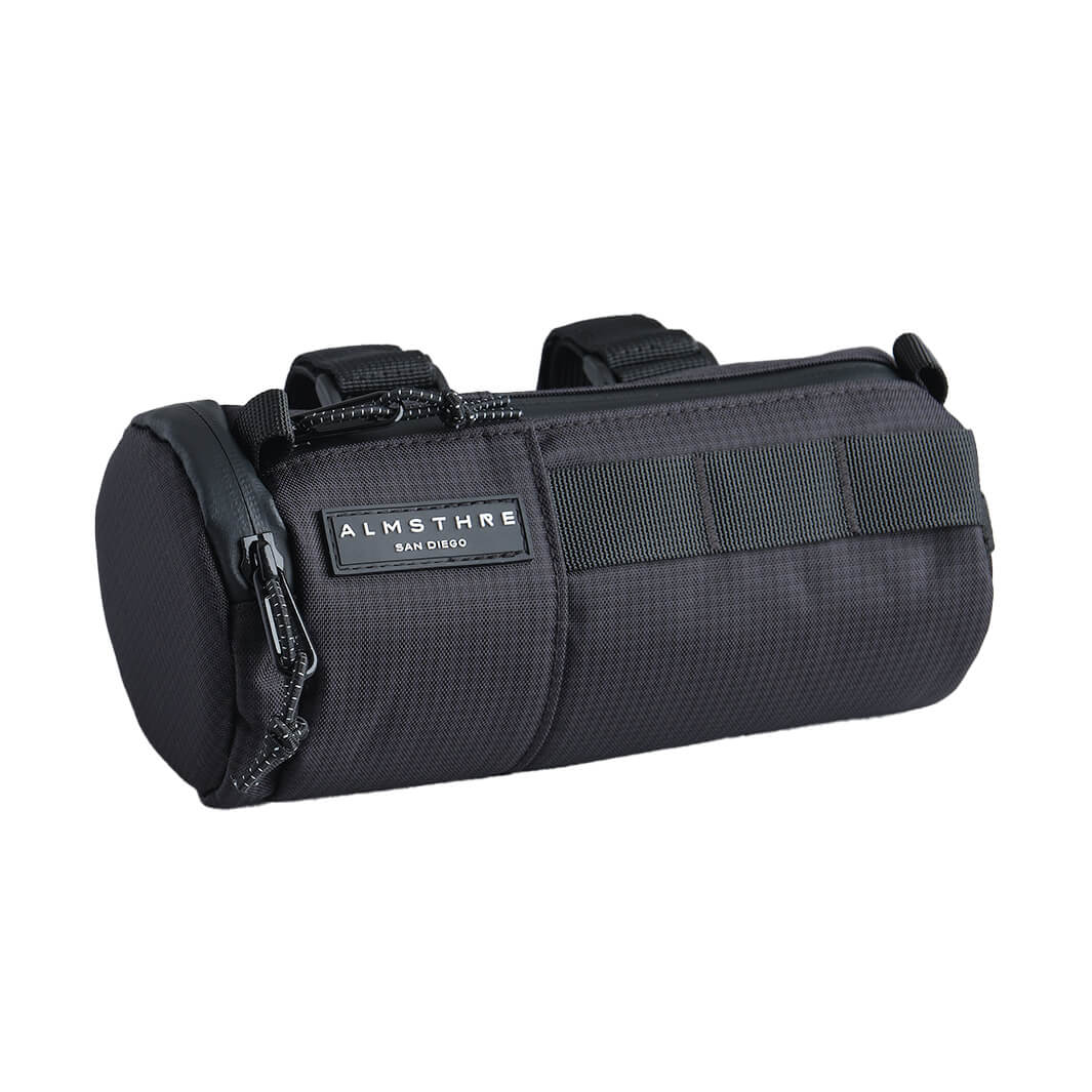 ALMSTHRE Compact Bar Bag in black shown with top zipper and adjustable straps for secure bike mounting