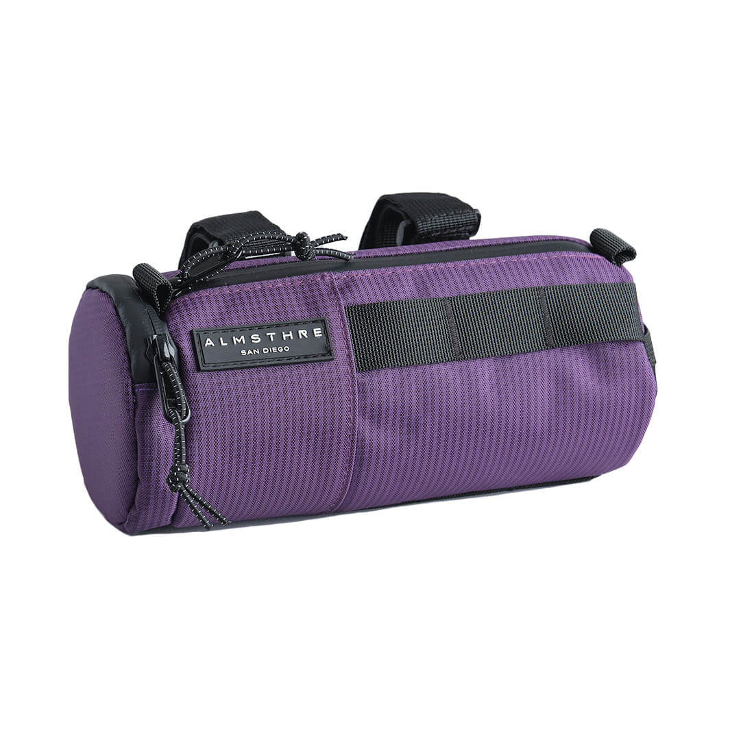 ALMSTHRE Compact Bar Bag in purple with durable fabric and zippered compartments for secure bike storage