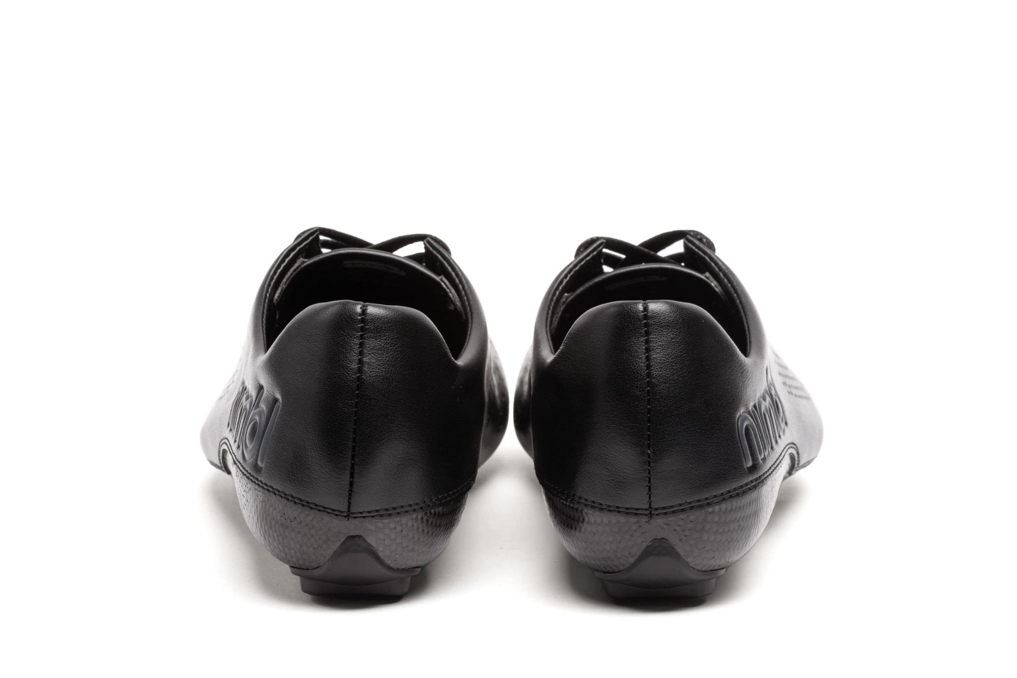 Rear view of Nimbl AIR cycling shoes in black highlighting sleek heel design and low-profile cleat area