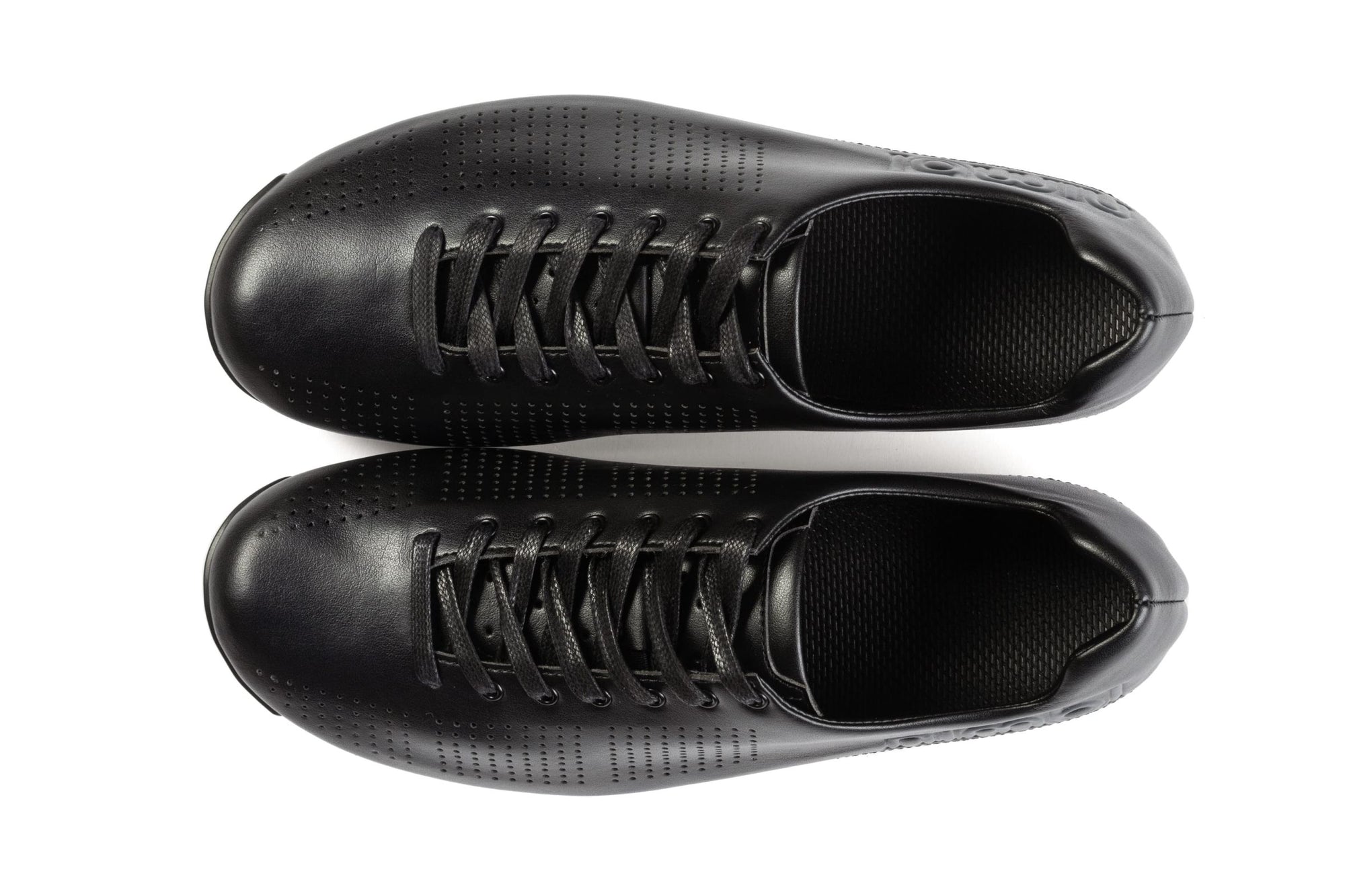 Top view of black Nimbl AIR cycling shoes featuring sleek perforated design and streamlined lacing for optimal performance