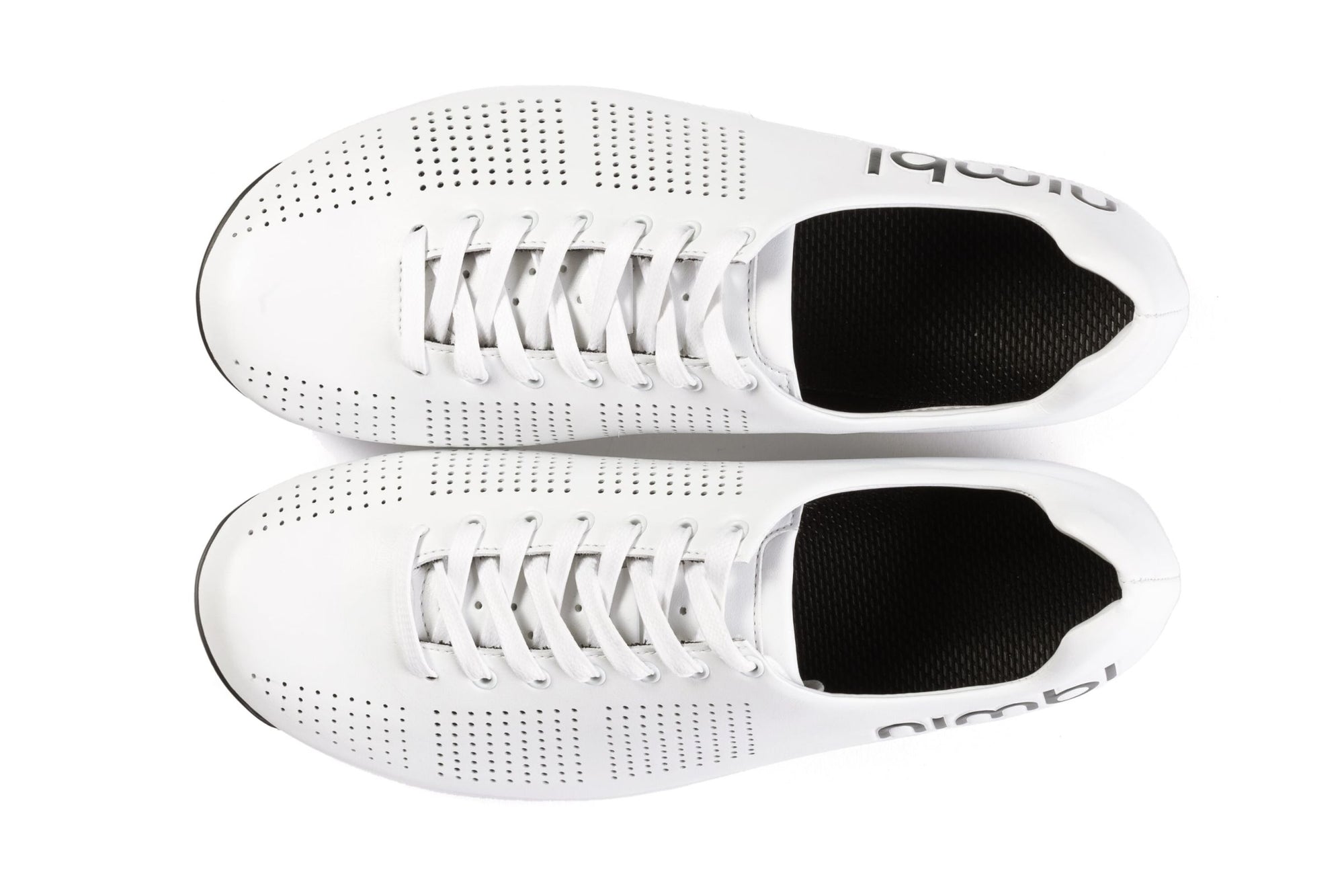 Top view of white Nimbl AIR cycling shoes with perforated design and black inner lining for breathability and lightness