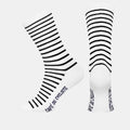 Cafe du Cycliste Breton Socks - Navy featuring white fabric with navy blue horizontal stripes and brand name detail on the sole.