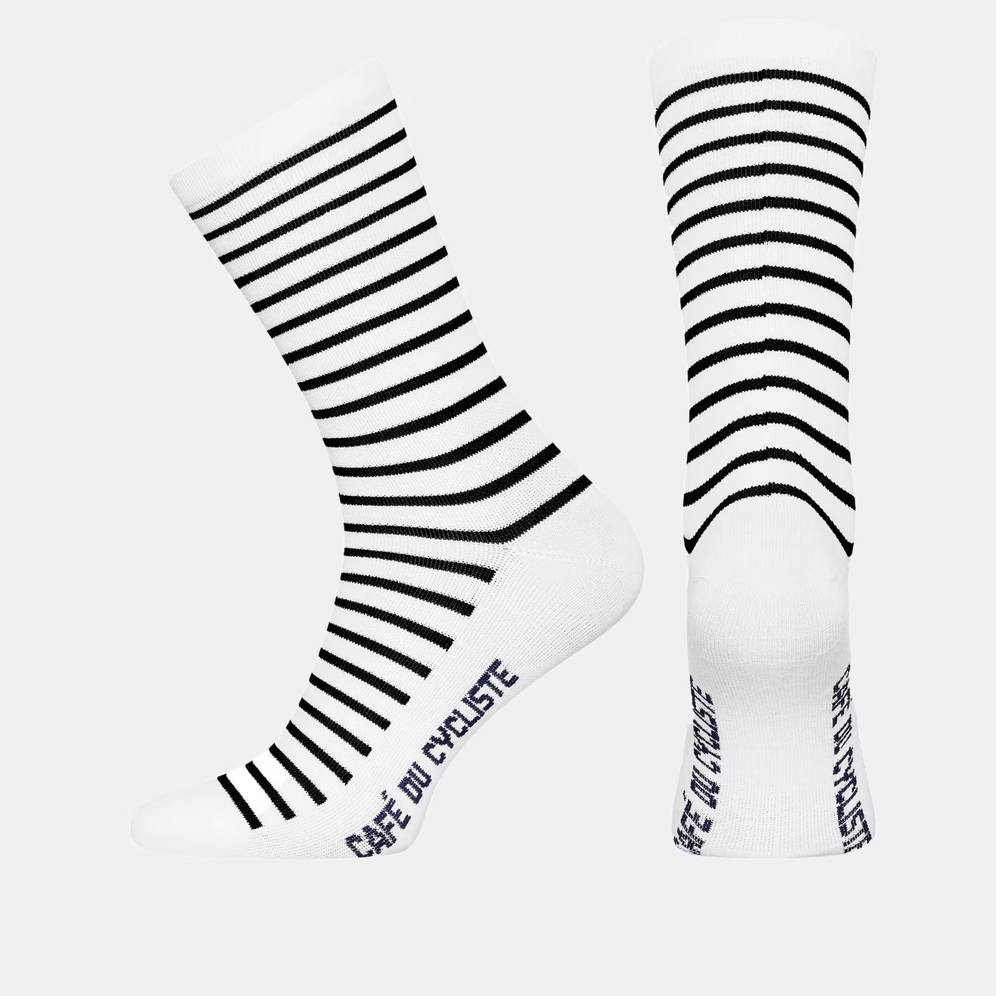 Cafe du Cycliste Breton Socks - Navy featuring white fabric with navy blue horizontal stripes and brand name detail on the sole.