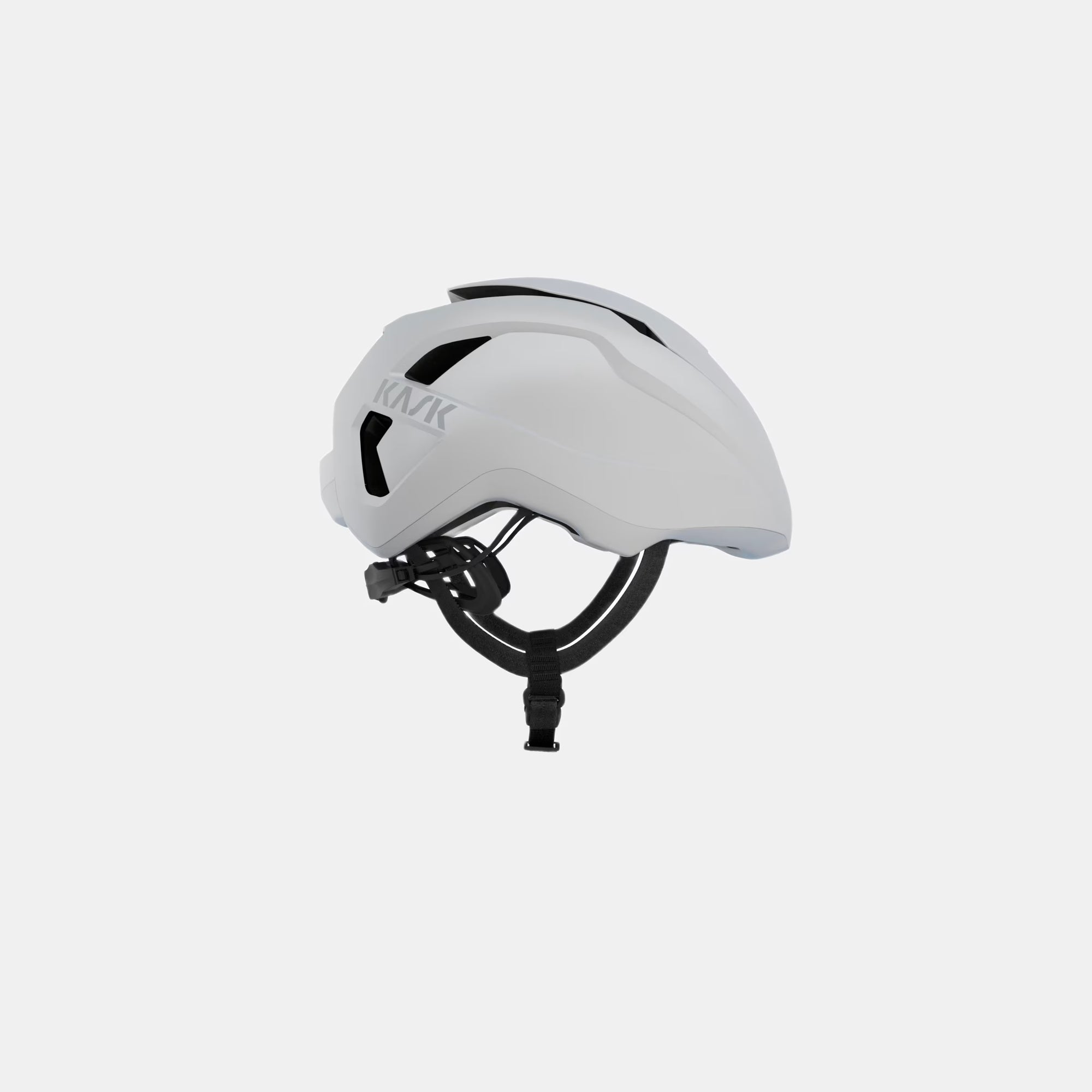 Kask Wasabi Helmet - White Matt side view showing aerodynamic design with adjustable vent and black strap