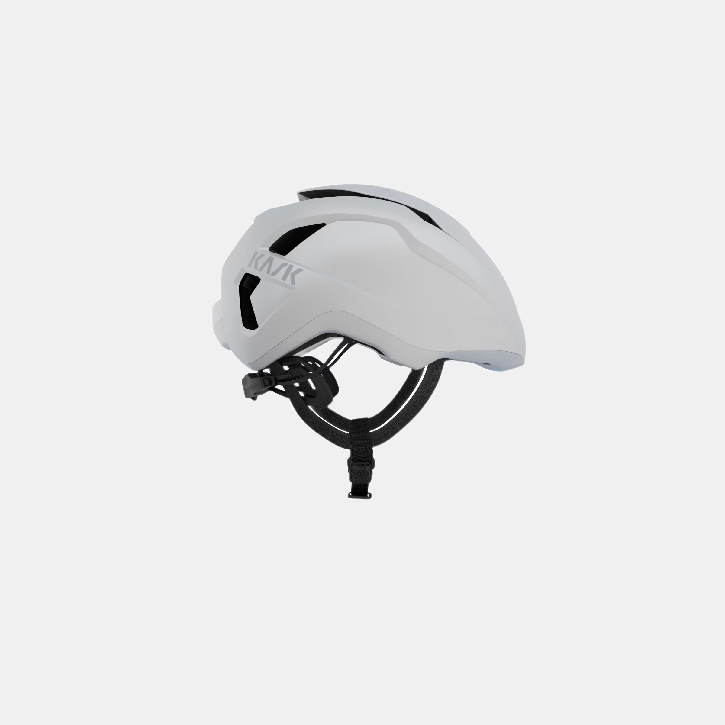 Kask Wasabi Helmet - White Matt side view showing aerodynamic design with adjustable vent and black strap